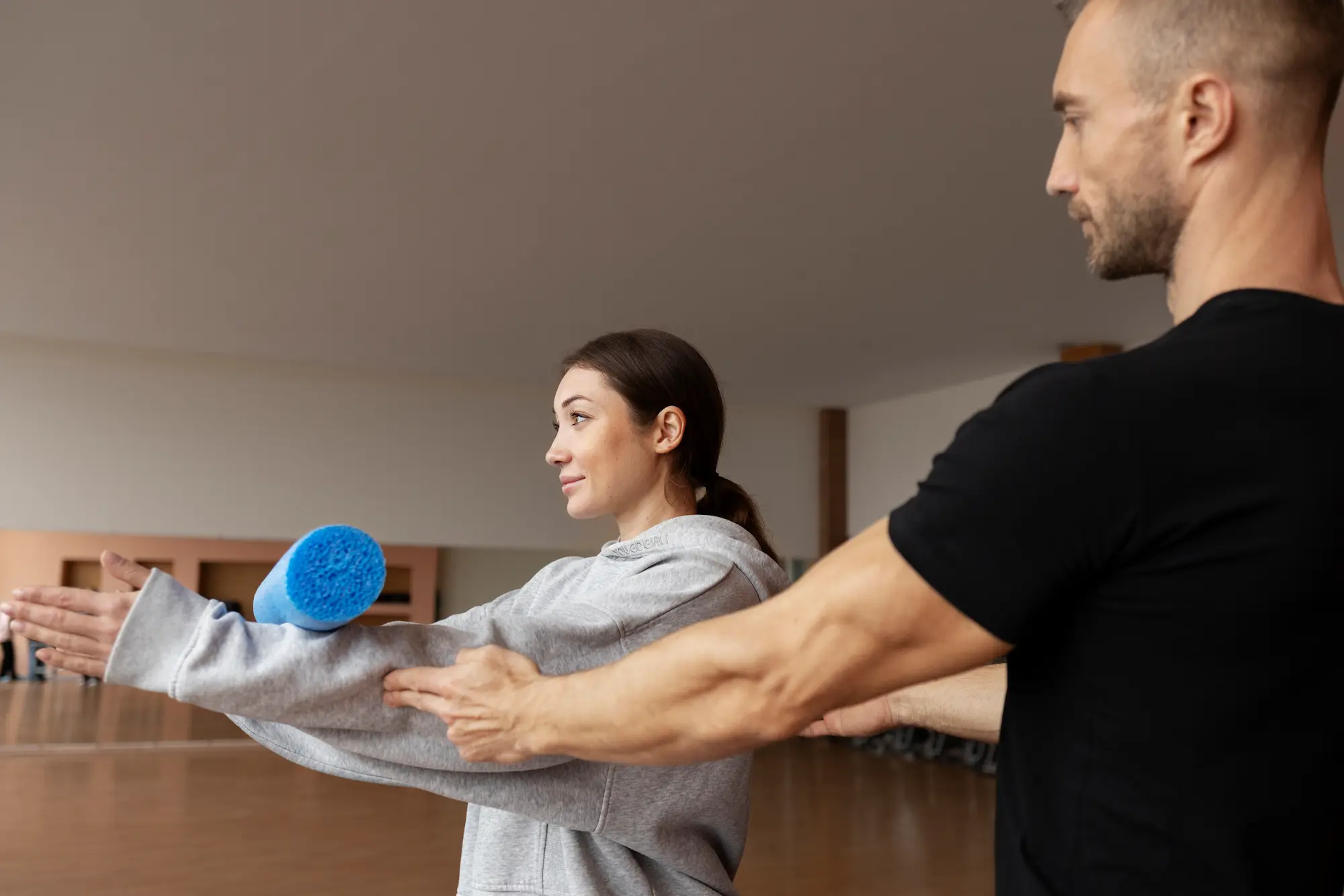 Therapist assisting patient with Active Release Technique