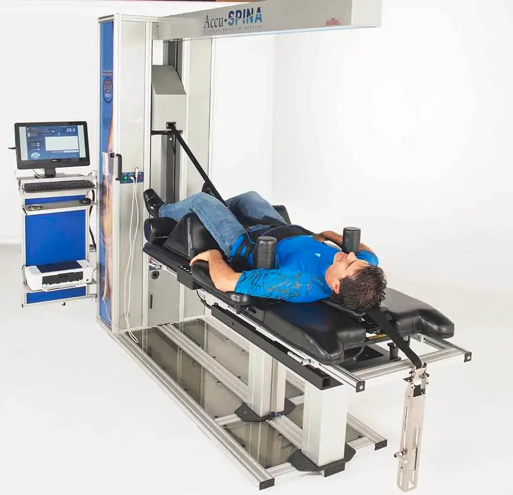 Patient receiving IDD Therapy on the Accu-SPINA system