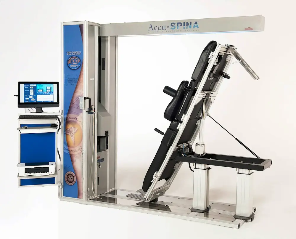 Close-up of the Accu-SPINA IDD Therapy machine controls